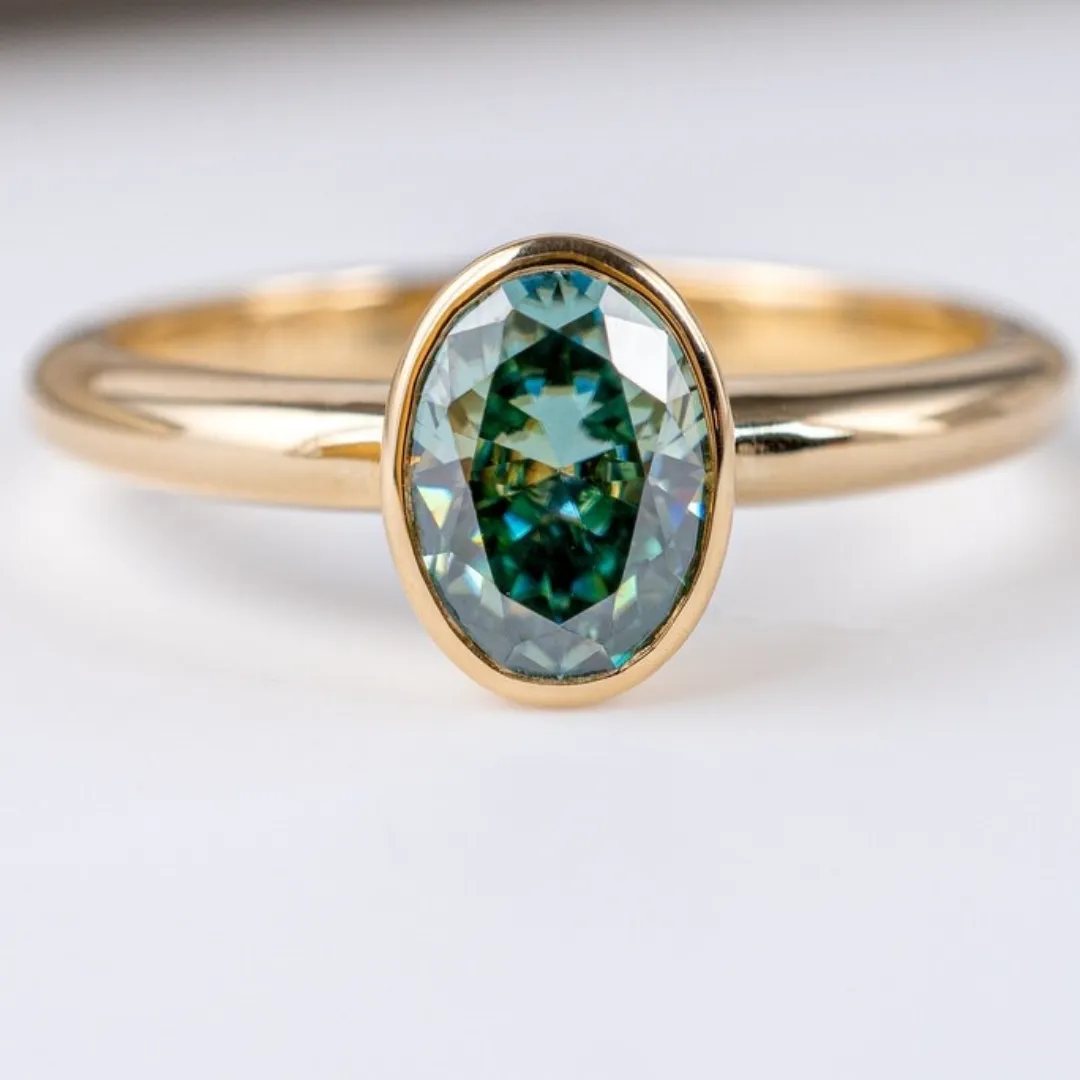 /public/photos/live/green oval cut ring (4).webp
